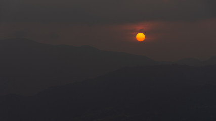 Sun over mountains