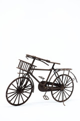 Miniature bicycle on white background.