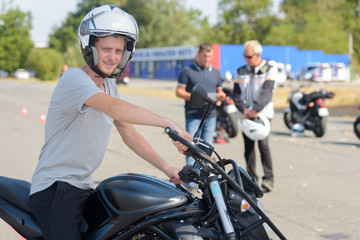 Fototapeta na wymiar young man doing his motorbike test