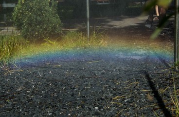 Rainbow in the street, lucky sign