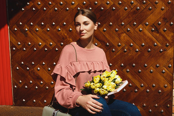 girl near the red facade