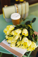 bouquet of yellow tulips on the table