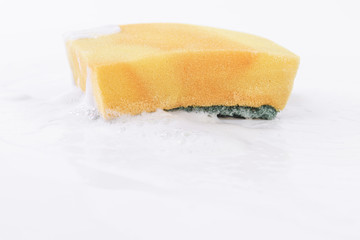 Dishwasher sponge with many bubble of liquid