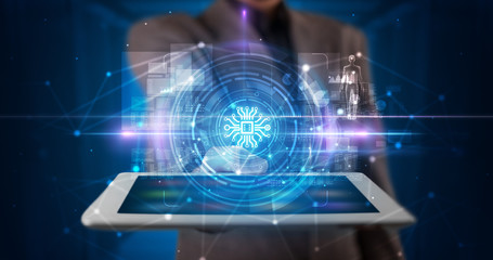 Hand holding tablet with online security and data protection concept
