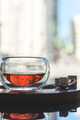 Glass Cup of tea on the table in the cafe