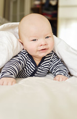   baby boy on the bed