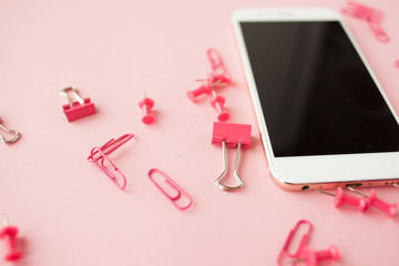 Shattered Pink Stationery, white smartphone, Pink background. Flatlay.