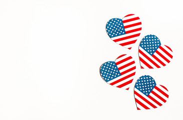 American Independence day background with blue, white and red mixed stars and hearts. Celebration of American independence day, the 4th of July (the Fourth of July). Holiday concept. With copy space. 
