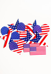 American Independence day background with blue, white and red mixed stars and hearts. Celebration of American independence day, the 4th of July (the Fourth of July). Holiday concept. With copy space. 