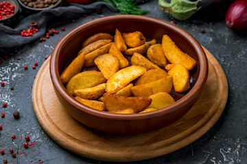 The potatoes wedges on the Board