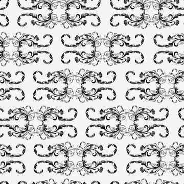 Seamless vector pattern with black curls on a white background