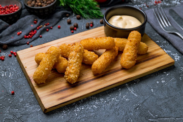 fried Cheese sticks on the board