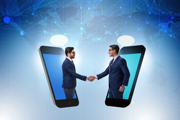 Concept of communication with businessmen handshaking