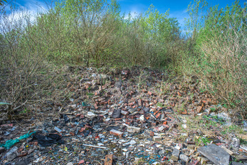 Site of former gas works, now derelict and overgrown after many years of disuse.