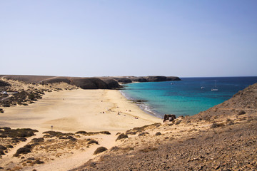 View from steep cliff into blue lagoon beach - Playa Papagayo, Playa Blanca - Lanzarote