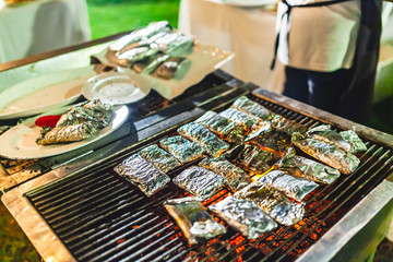 Salmon fillet seasoned for grill. Fresh salmon piece about to be grilled. Picnic and BBQ during a summer time.