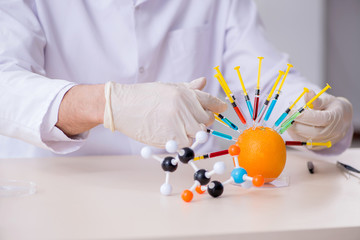 Male nutrition expert testing food products in lab