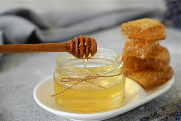 Pouring aromatic honey