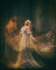 Slave, servant of darkness ... Queen albino. A blonde girl, like a ghost, in a white vintage dress, in a black room, a gothic, artistic photograph of a sorceress and a magician. Mary Magdalene