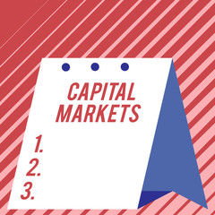 Text sign showing Capital Markets. Business photo showcasing Allow businesses to raise funds by providing market security Modern fresh and simple design of calendar using hard folded paper material