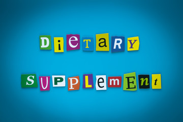 Text - Dietary Supplement on blue background from colorful letters. Card with an inscription. Headline, caption, heading on banner. Letter on bright illustration. Concept of diet nutrition, food.