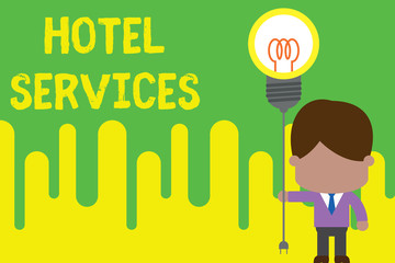 Handwriting text Hotel Services. Conceptual photo Facilities Amenities of an accommodation and lodging house Standing man tie holding plug socket light bulb to connect idea. Startup