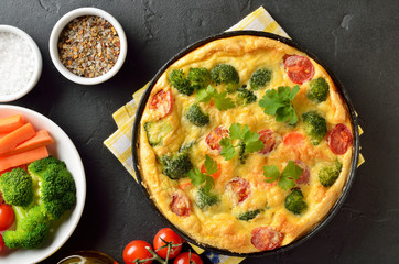 Frittata with broccoli and tomatoes