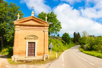 Fototapeta na wymiar Small church in countryside in a spring day in Tuscany, Italy