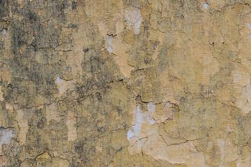Cracked old plasterwall, paint chips, textured background