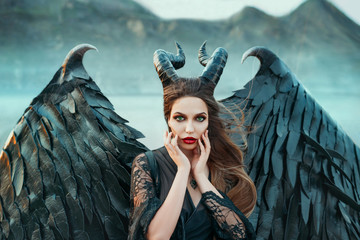 charming portrait of dark angel with sharp horns and claws on strong powerful wings, wicked witch...