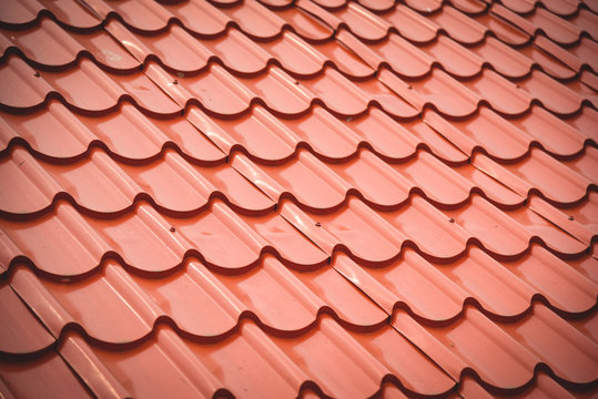 orange roof tiles texture background / home building construction roof tiles