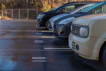 row of cars in parking