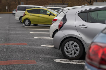 row of cars in parking