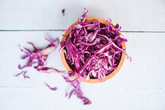 Cabbage purple / Shredded red cabbage slice in a wooden bowl