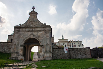 Fototapeta na wymiar Gate of the Holy Cross Monastery, Lysa Gora, Swietokrzyskie Mountains