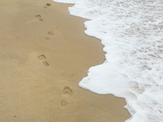pegadas na areia