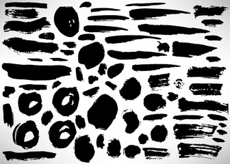 Set of black hand drawn grunge elements, geometrical shapes, rings, circles, banners, brush strokes isolated on white. Vector illustration.