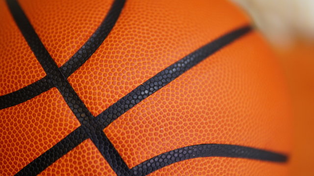Closeup detail of basketball ball texture background