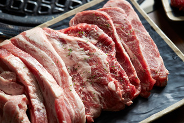Sliced steak meat with dried parsley 