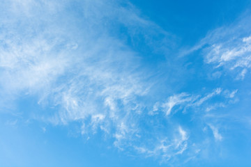 Naklejka na ściany i meble Cirrus clouds on blue sky background.