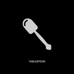 white tablespoon vector icon on black background. modern flat tablespoon from kitchen concept vector sign symbol can be use for web, mobile and logo.