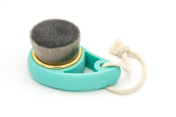 Brush for deeply clean and face wash, on white background. Face spa concept, beauty blog