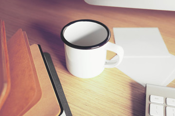 Office desk table with notebook and coffee cup