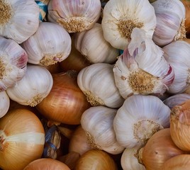 Pile of whole fresh onions on a food market in Portugal