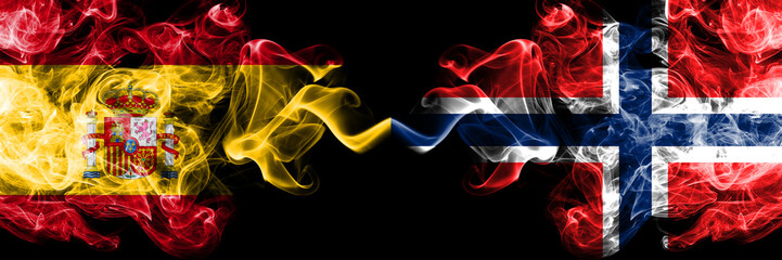 Spain vs Norway, Norwegian smoky mystic flags placed side by side. Thick colored silky smokes flag of Spanish and Norway, Norwegian