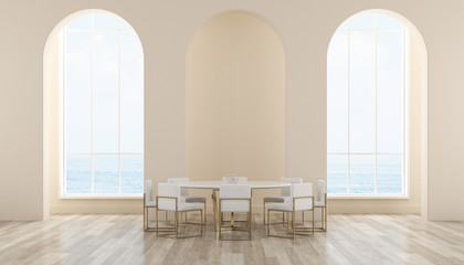 View of sweet interior space with arch window on sea view background,Dining room with round table...