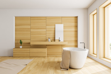 Obraz na płótnie Canvas Side view of white and wooden bathroom