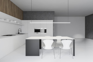 White and gray kitchen interior with table