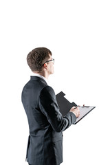 Businessman with clipboard taking notes