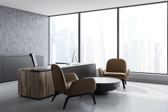 Concrete CEO office corner, leather armchairs